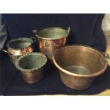 Four copper bowls