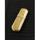 A small brass lighter