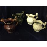 Four various Arthur Wood and Sons pitchers