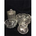 Four Bohemian glass pieces. A larger and smaller bowl and a larger and smaller lidded jar.