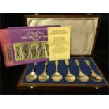 A box set of six silver fruit spoons 240 grms