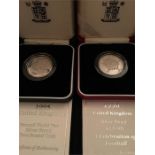 A 1995 Second World War silver proof two pound coin and a 1996 silver proof two pound coin