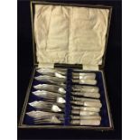 Six person set of silver plated fish knives and forks with pearl handles