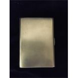 Silver cigarette case assay marked but polished to illegible. 201g