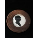 A silhouette of a lady signed Leon