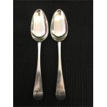 A pair of serving spoons hallmarked London.
