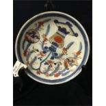 A Chinese saucer c.1720 (small chips)