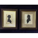 Two silhouettes, a man and a woman, produced by James Scanin in Windsor on 13th April 1831 - framed