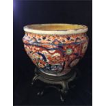 A Chinese Imari goldfish bowl on stand (AF)