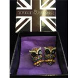 A pair of Butler and Wilson designer, unworn, Owl earrings