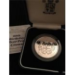 A Royal Mint silver proof crown celebrating the 90th Birthday of the Queen Mother.