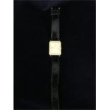 An 18ct gold Seiko watch on a leather strap Japan 6730 0720 R