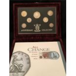 A boxed set of silver coins celebrating the silver anniversary of decimal currency collection by the