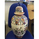 Large Delft lidded urn with blue lion finial. approximately 52cms tall