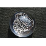 A Lalique paperweight with Art Deco style ladies