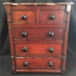 An apprentice piece a two over three mahogany chest of drawers (missing foot)