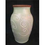 A large Denby vase