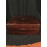 A mahogany sewing box with brass