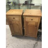 A pair of pine bedside cabinets