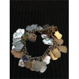 Silver charm bracelet with silver and enamel charms (51g)