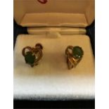 A boxed pair of Jade and rolled gold earrings