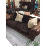 Large three seater sofa with cushions