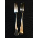 Two silver forks hallmarked London 1803-04, and 1804-05