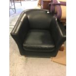 A single dark brown leather arm chair
