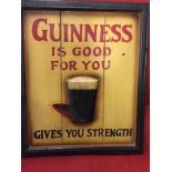 A wooden Guinness Advert picture