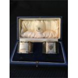 A boxed set of Mappin and Webb silver napkin rings Hallmarked Birmingham 1933-34