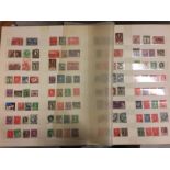 A large stamp album of mostly pre-decimal Australian stamps