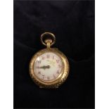 A 14ct gold and enamel faced ladies pocket watch