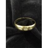 A 9ct gold and diamond ring (2.8g total)