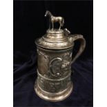 A silver tankard, hallmarked London 1772-73 with later decoration and horse theme.