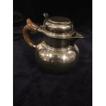 Victorian silver hot water jug marked London 1903. 275.8gms