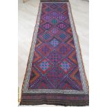 An Uzbek hand-knotted Suzni kilim multicoloured runner with bright contrasting designs, single