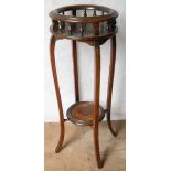 A Victorian mahogany jardiniere stand with galleried top on splayed legs with under tier, 100 cm H x