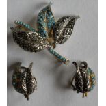 A pair of 1920s marcasite and turquoise earrings with matching brooch on silver mounts