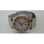 A Baume & Mercier Geneve Quartz gent's bracelet watch with black Roman numerals and yellow gold