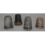 A silver advertising thimble for 'James Walker, The London Jeweller' and two others all with Chester