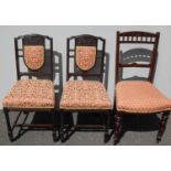 A pair of late Victorian occasional chairs with carved top rails, fabric upholstered supports and