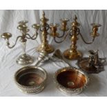 A pair of silver plated table two-branch candelabra and one similar, two wine coaster, two wine