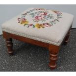 A Victorian walnut square footstool with embroidered top, raised on turned legs, 8 x 16 x 16 cm