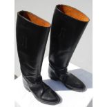 A pair of size-4 Regent riding boots in good condition