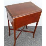 An Edwardian mahogany lady's work table with overall string inlay, hinged lid , fitted interior on
