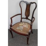 An Edwardian rosewood carver chair with elaborate brass marquetry to splat, carved arm supports,