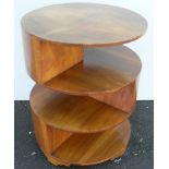 A Heal's-style Art Deco cylindrical walnut book table with quarter veneered top on four stylized