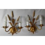 A pair of Art Deco gilt metal wall sconces in the form of wheat sheaves, fitted for electricity,
