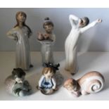 A Lladro figure of an unhappy young girl going to bed and five NAO bedtime figurines of children (6)