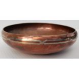 A Newlyn-style circular copper bowl with silvered inlay. 14 cm diameter and a papier mache dish (2)